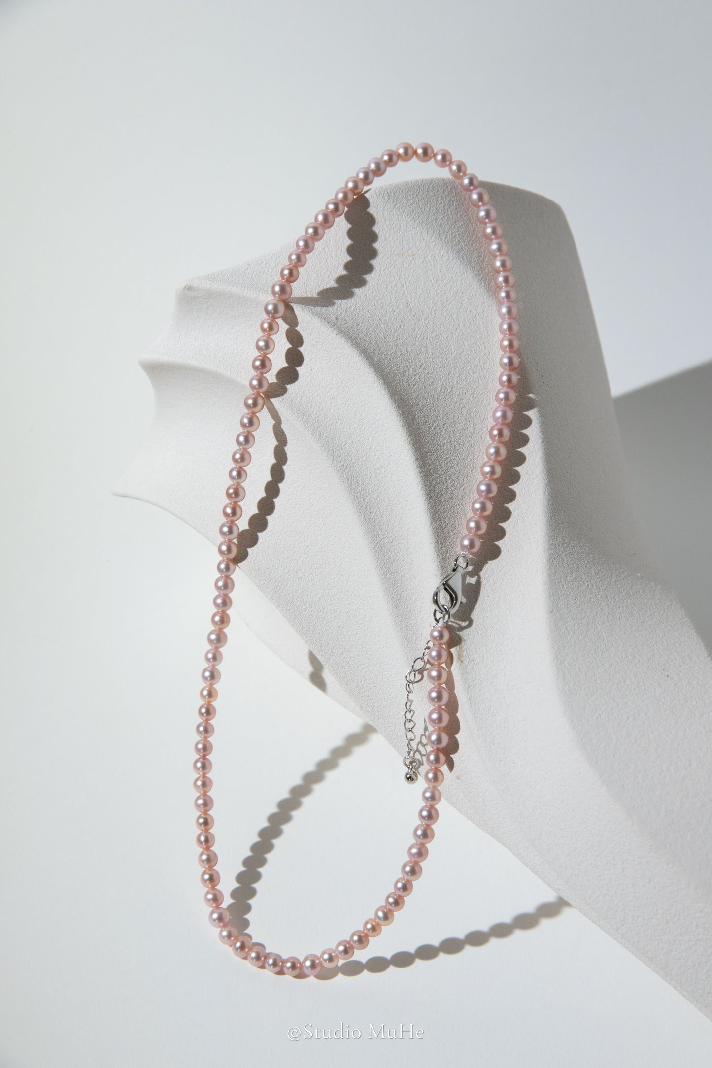 Summer Peach-Excellent level light peach colored flawless small round seedless pearls necklace