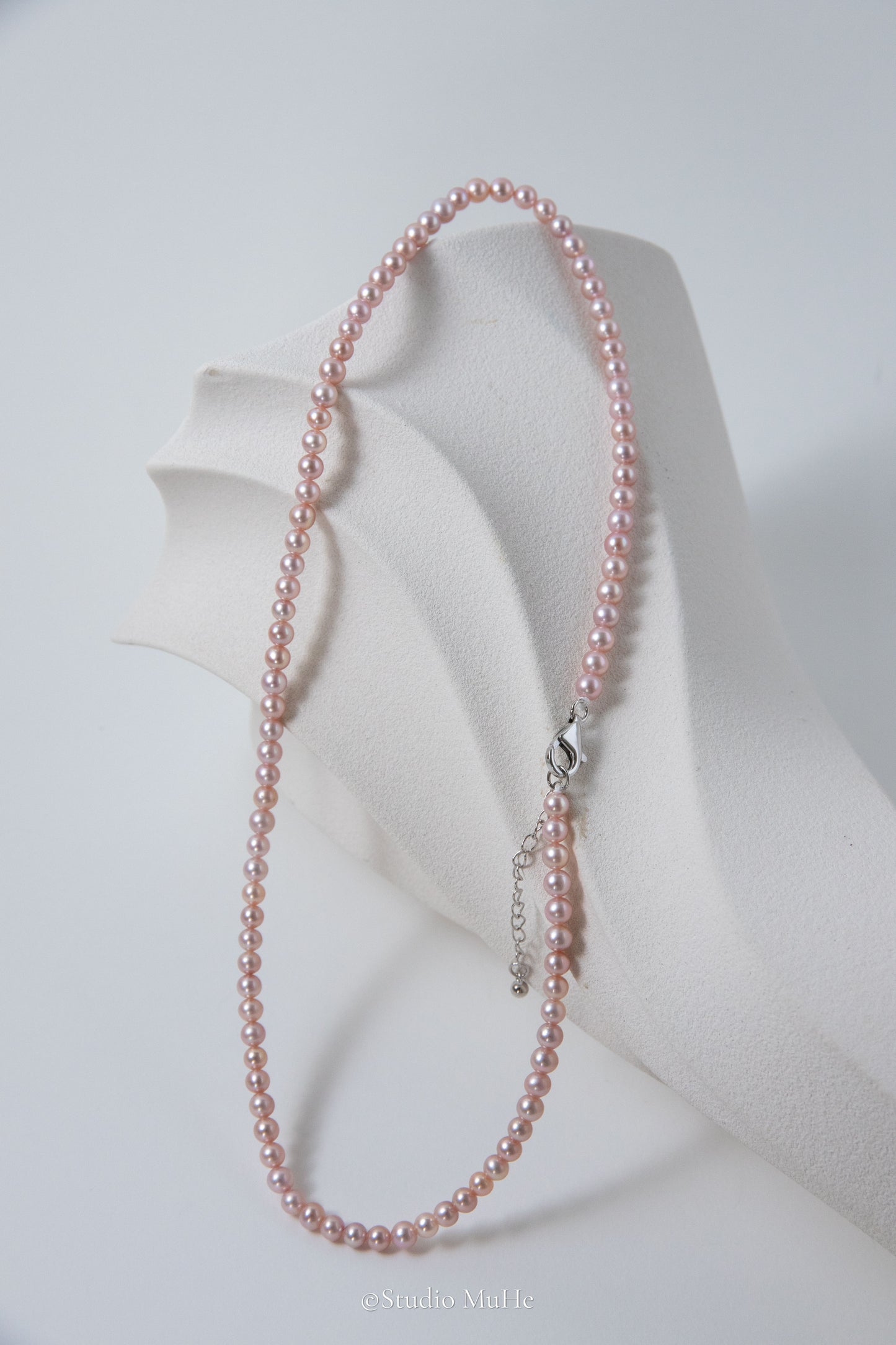 Summer Peach-Excellent level light peach colored flawless small round seedless pearls necklace