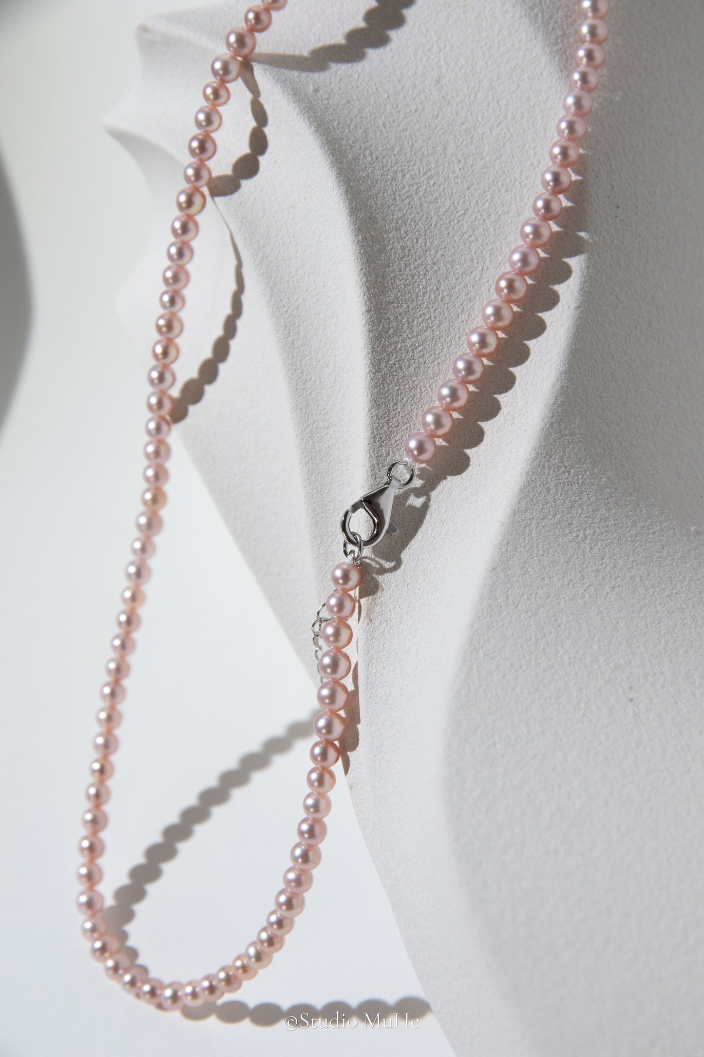 Summer Peach-Excellent level light peach colored flawless small round seedless pearls necklace