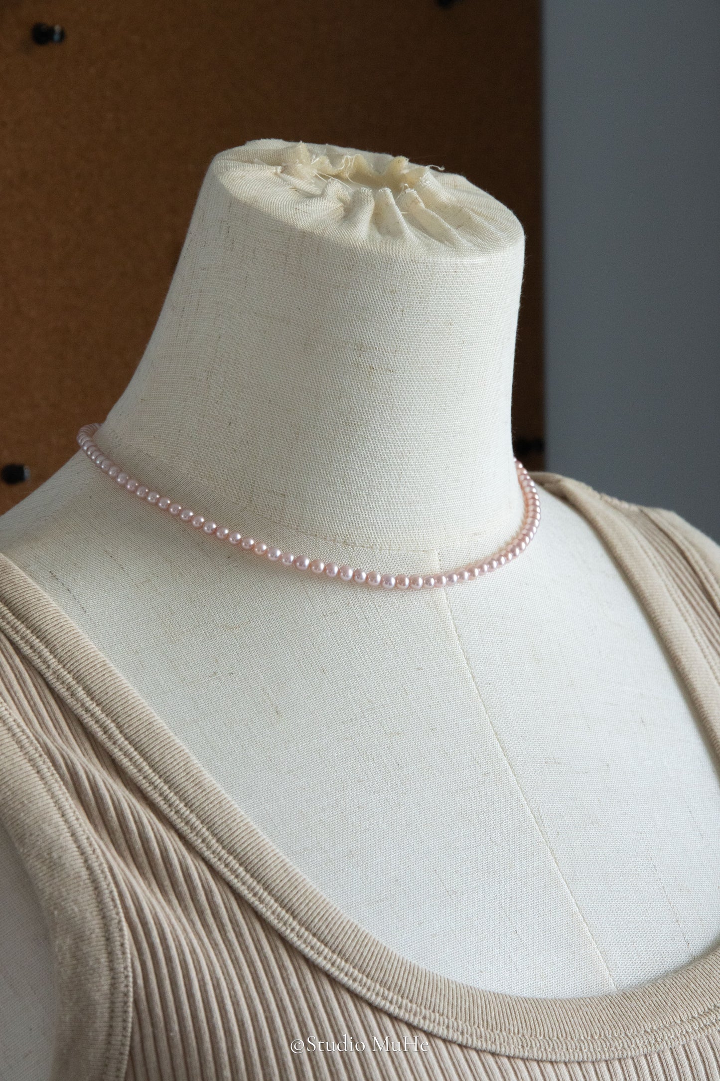 Summer Peach-Excellent level light peach colored flawless small round seedless pearls necklace