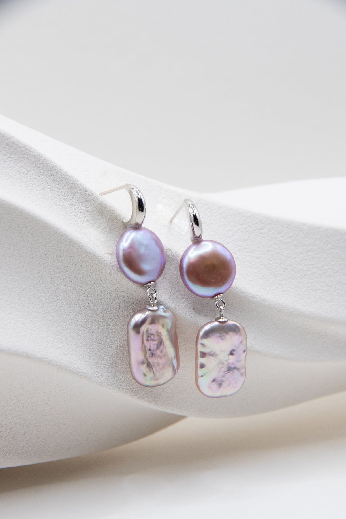 Round or Square? Still or Dangling?