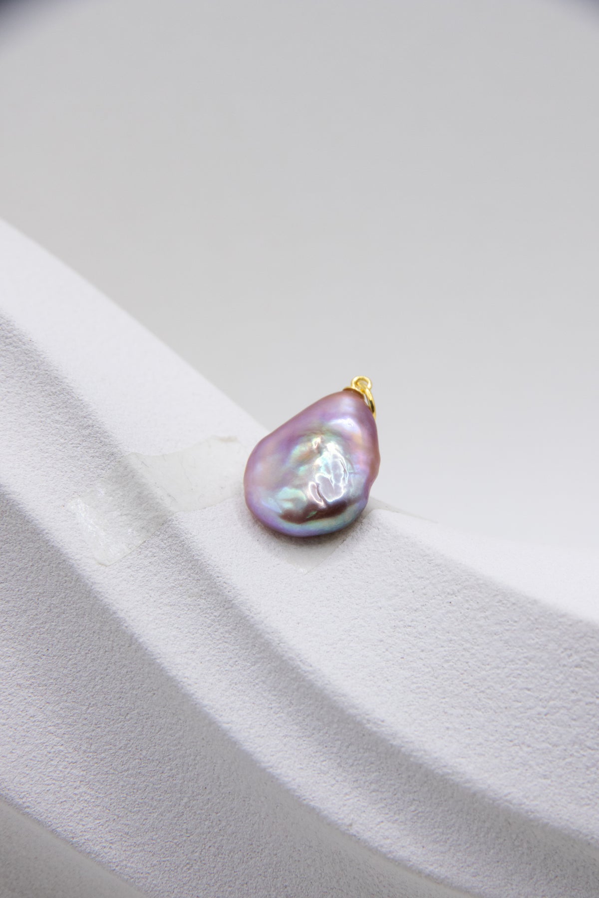 Flat purple drop pearl pendant