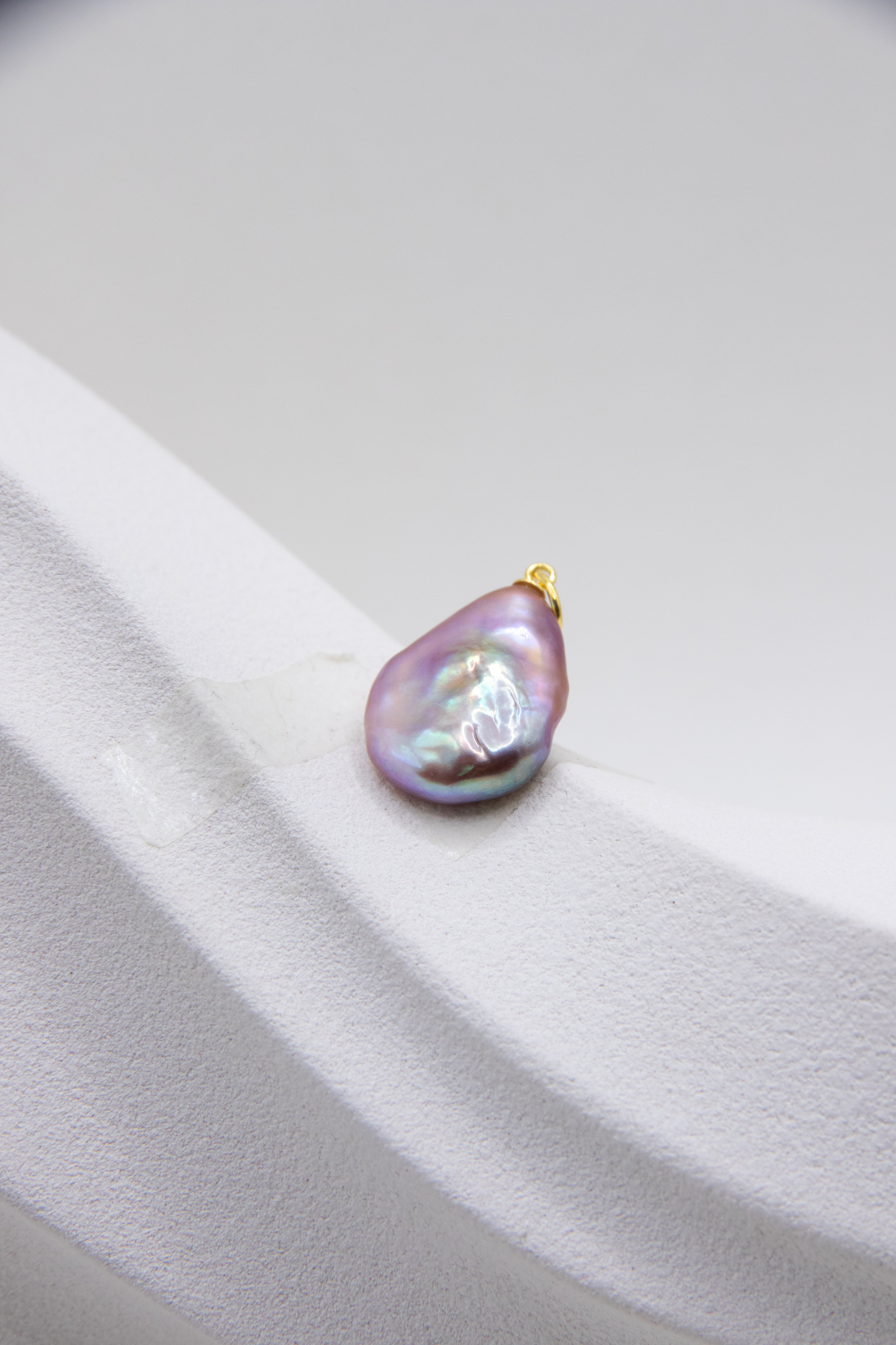 Flat purple drop pearl pendant