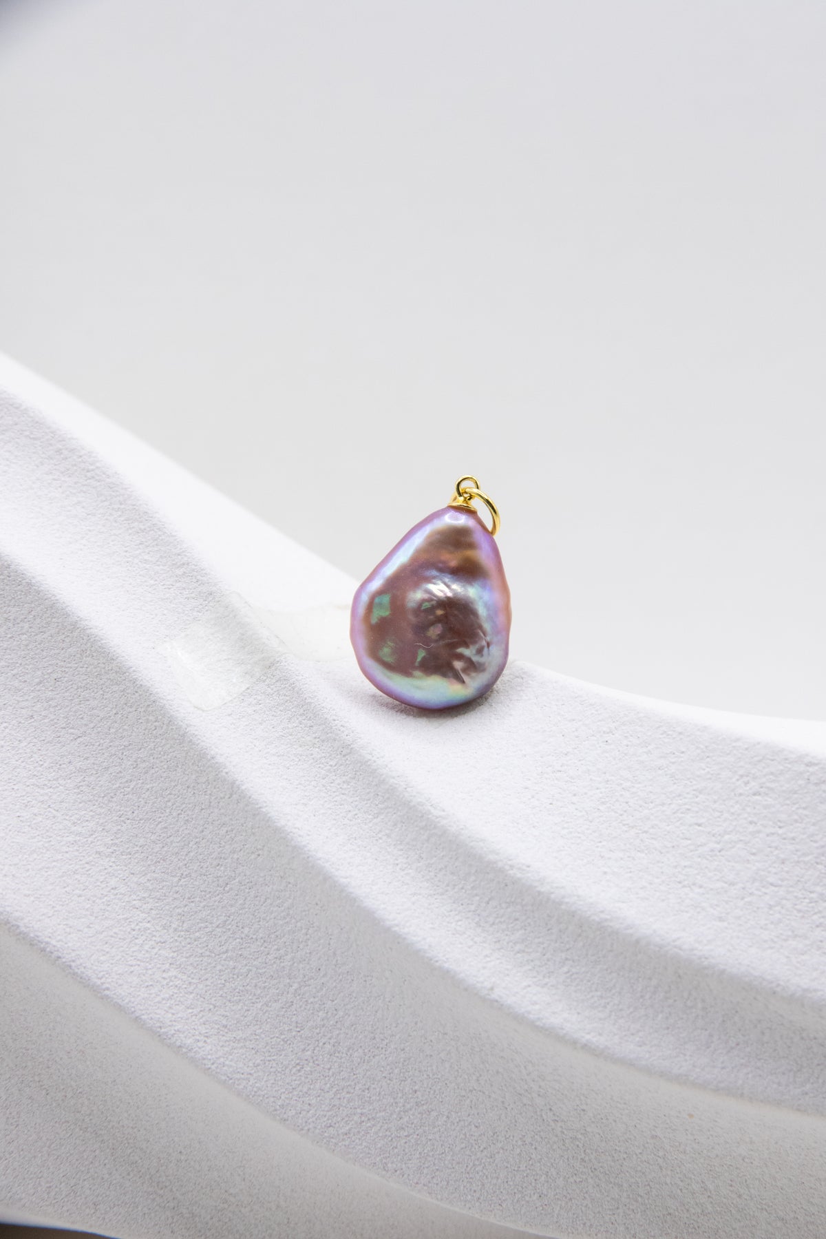 Flat purple drop pearl pendant