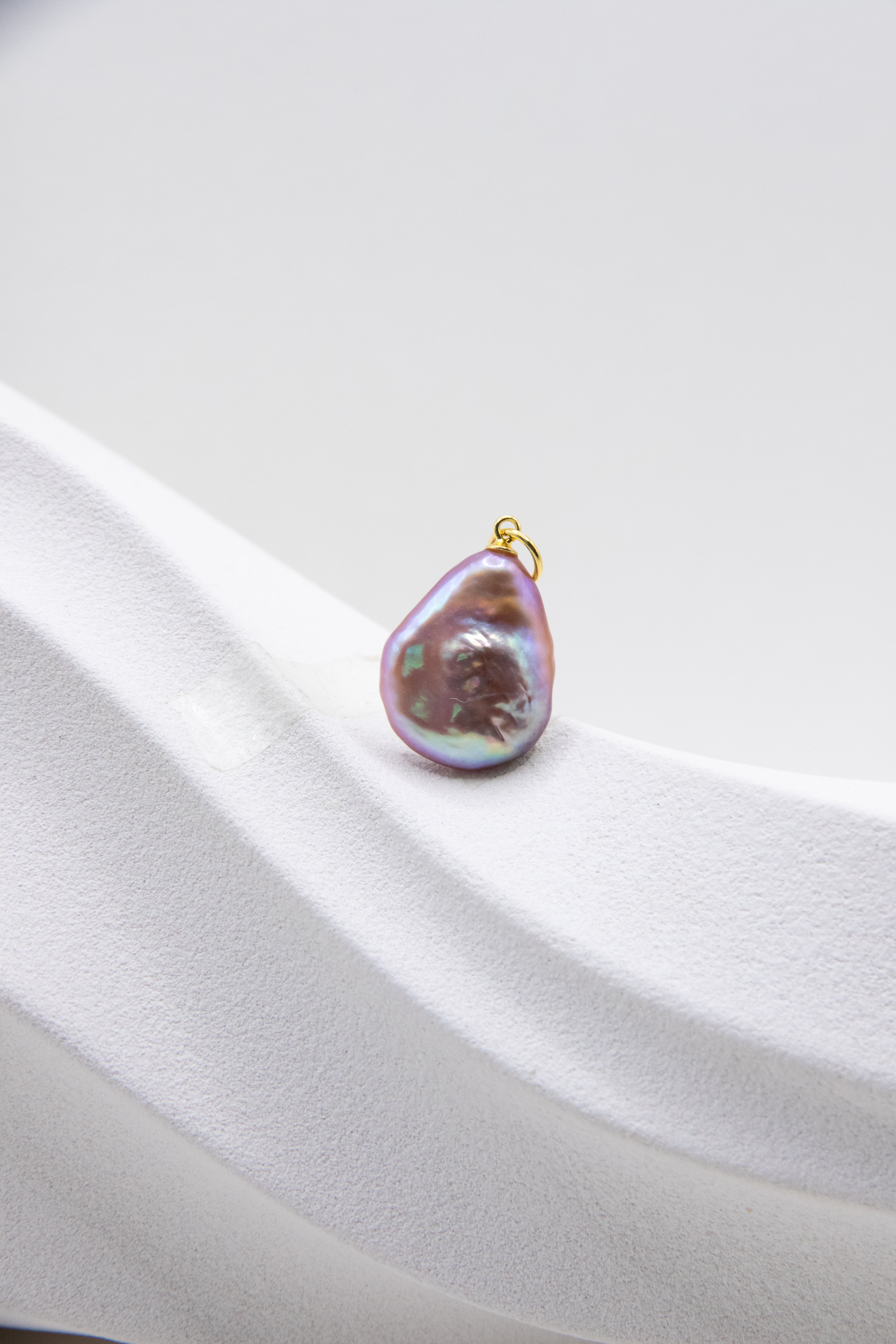 Flat purple drop pearl pendant