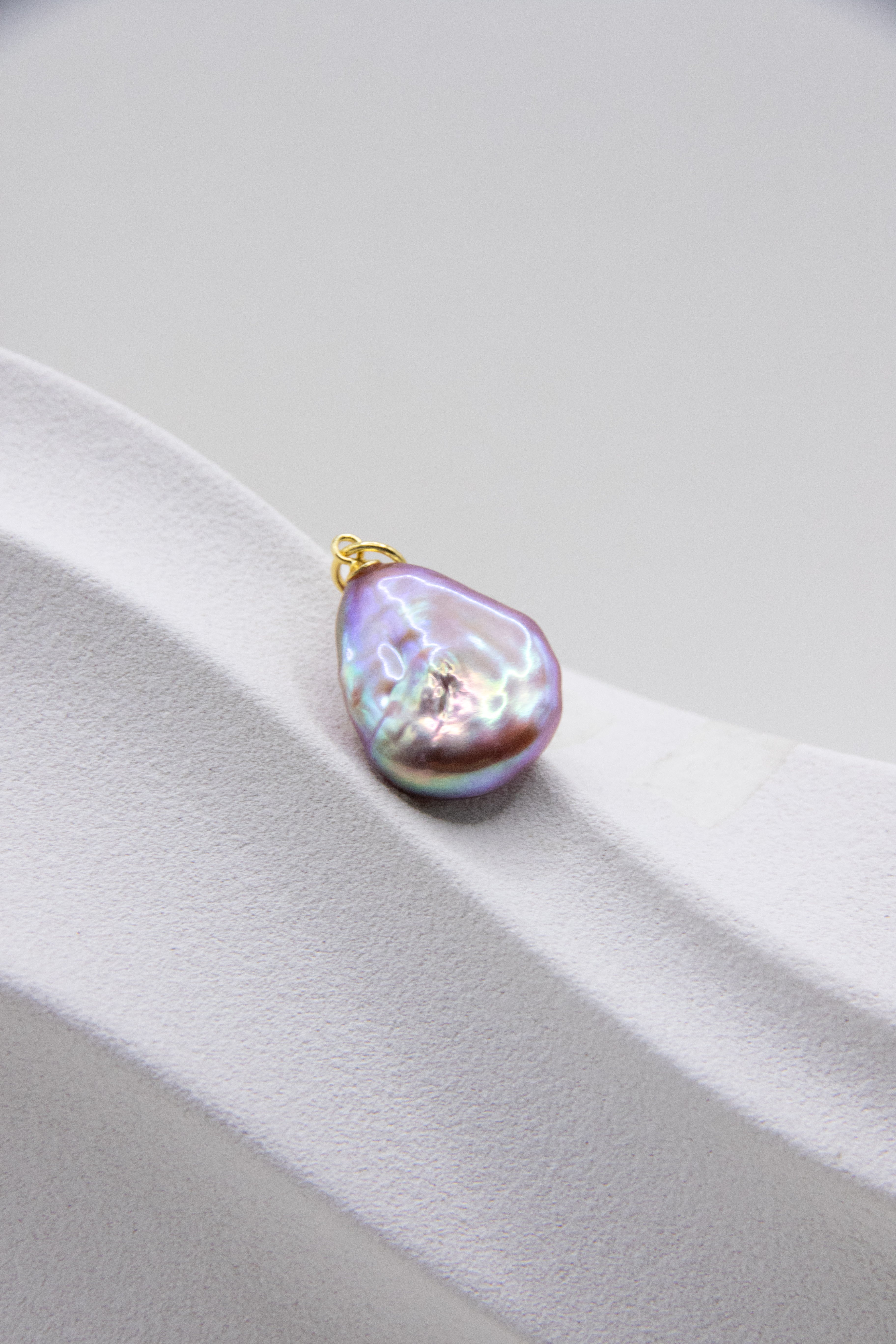 Flat purple drop pearl pendant