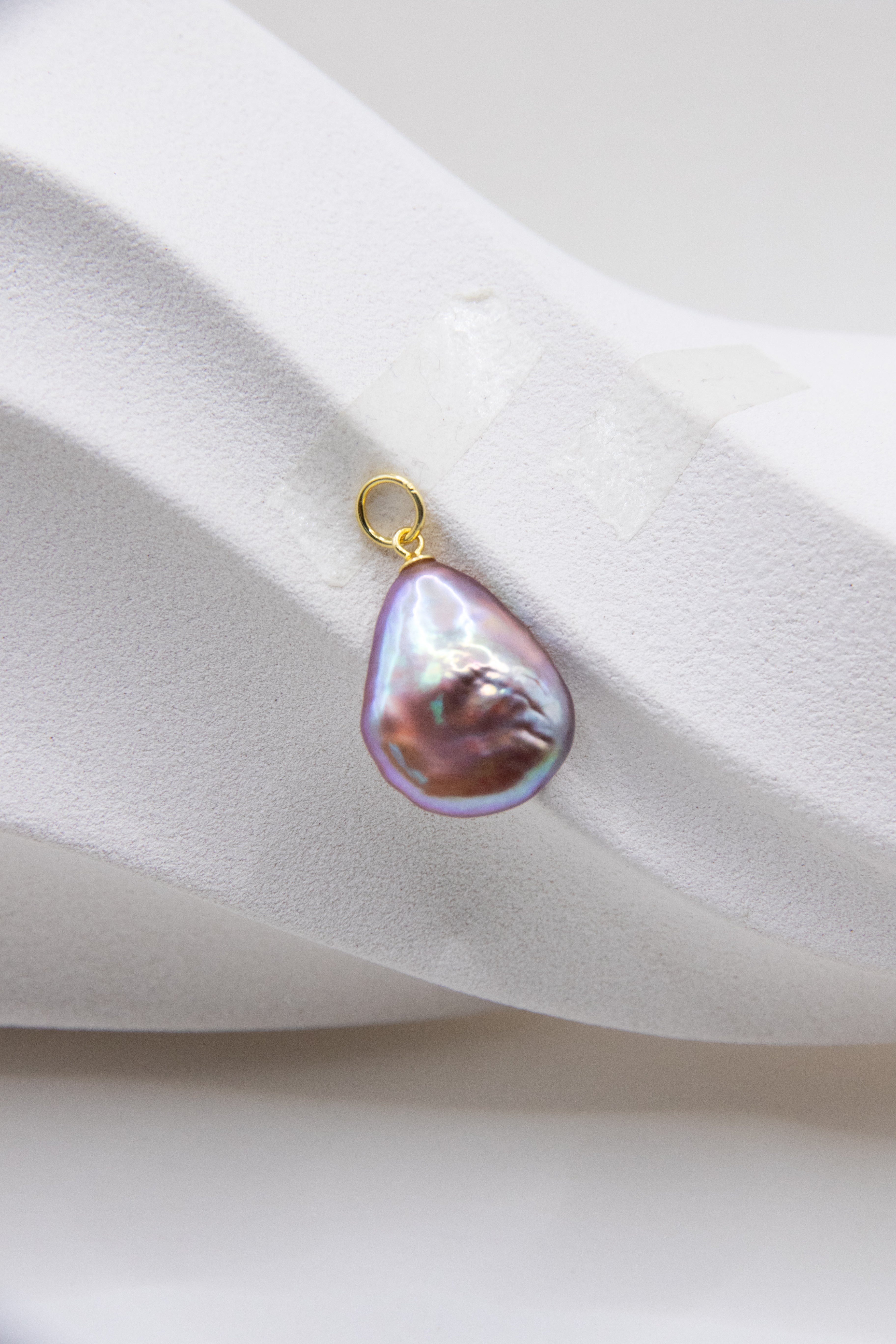 Flat purple drop pearl pendant