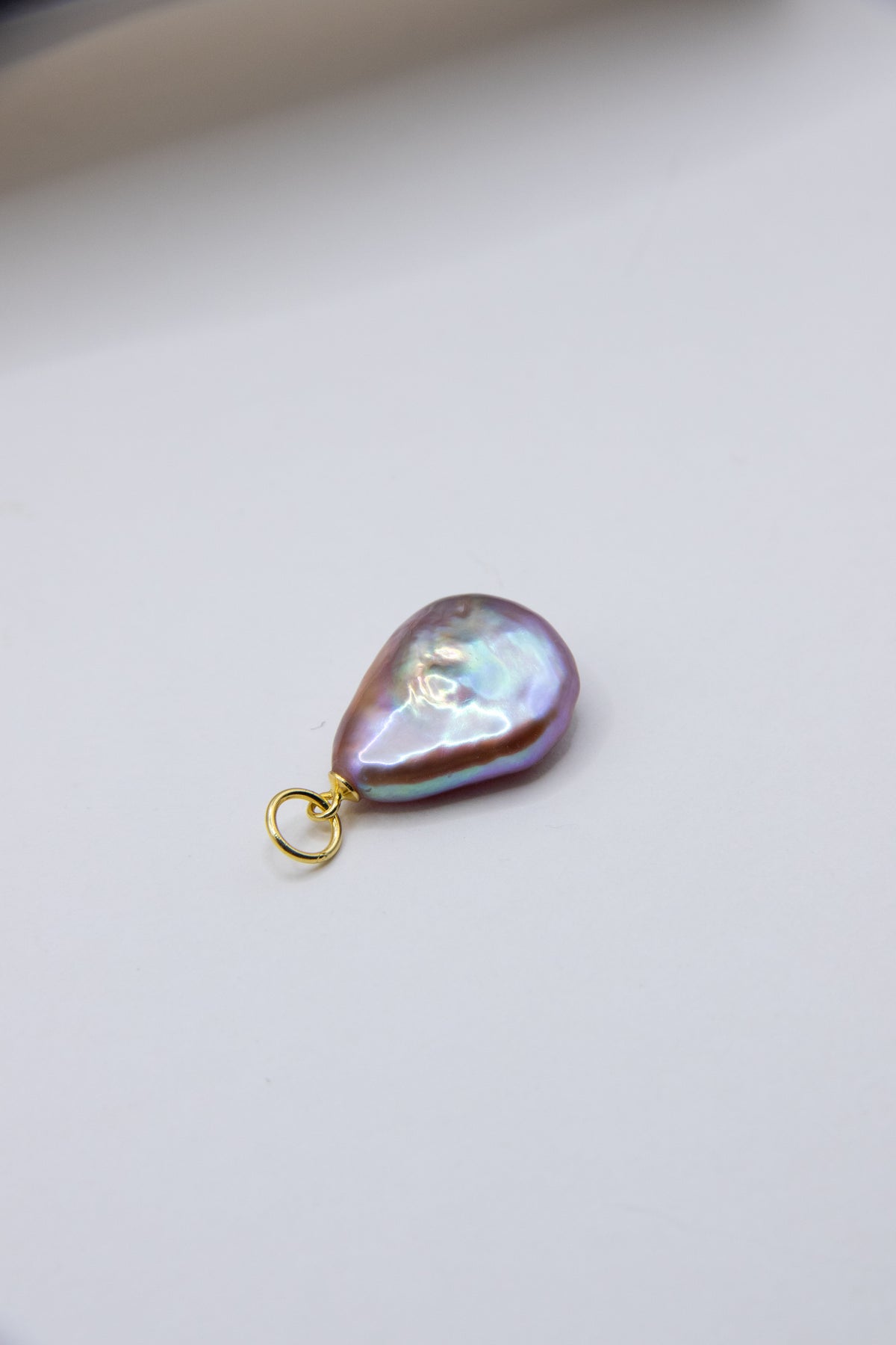 Flat purple drop pearl pendant