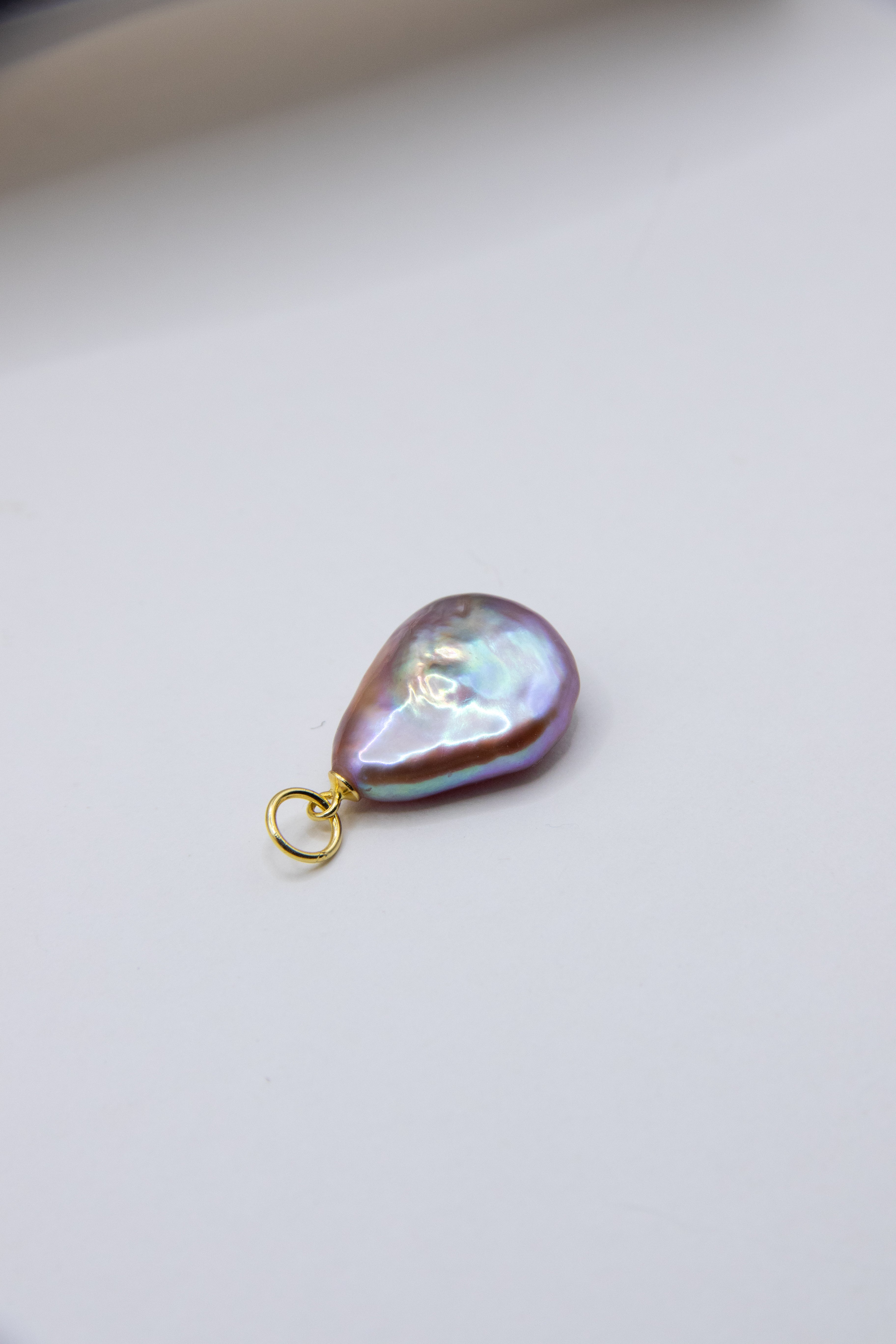 Flat purple drop pearl pendant