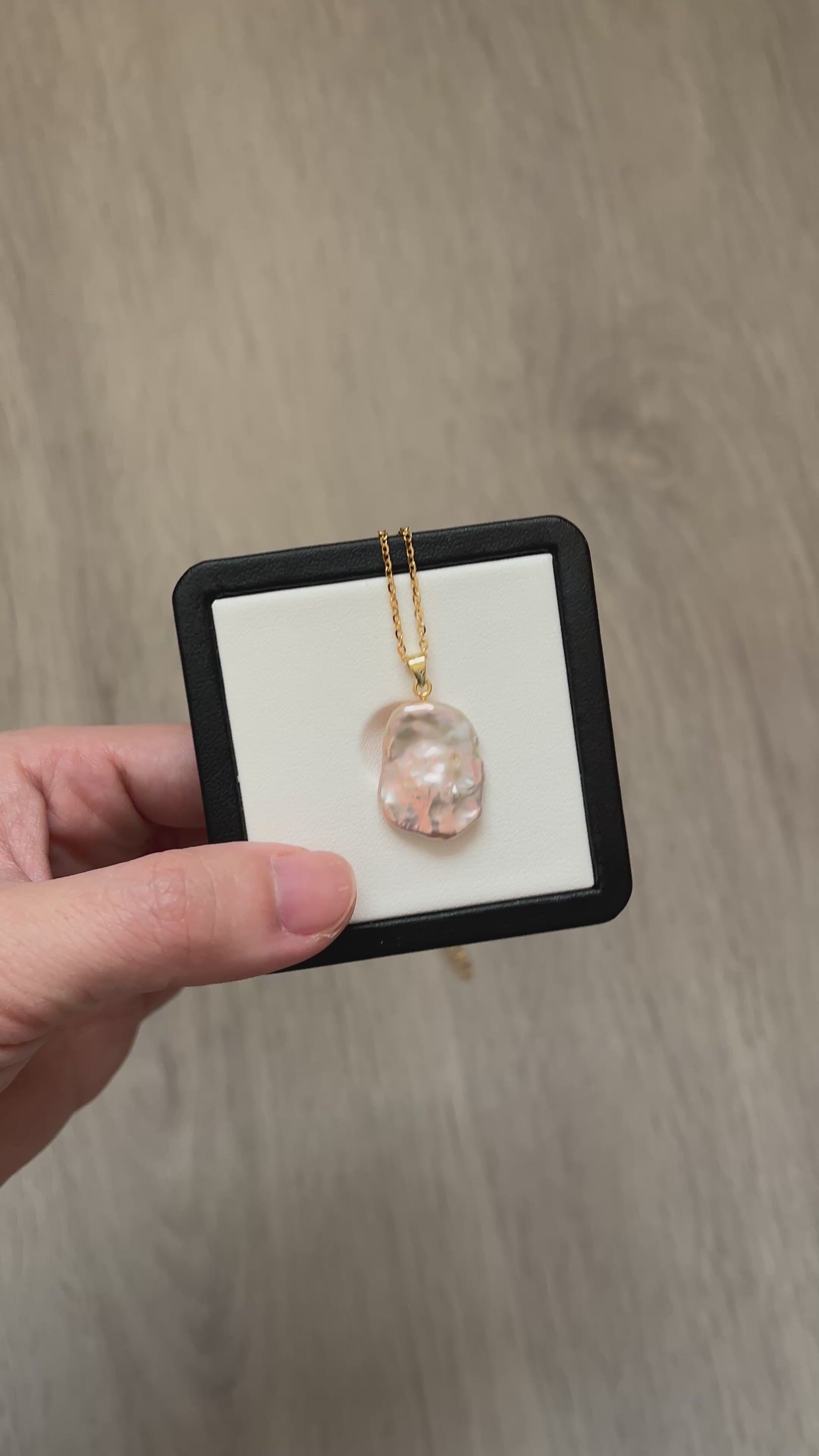 slight square- seedless- metallic crystal gold color -pearl necklace.